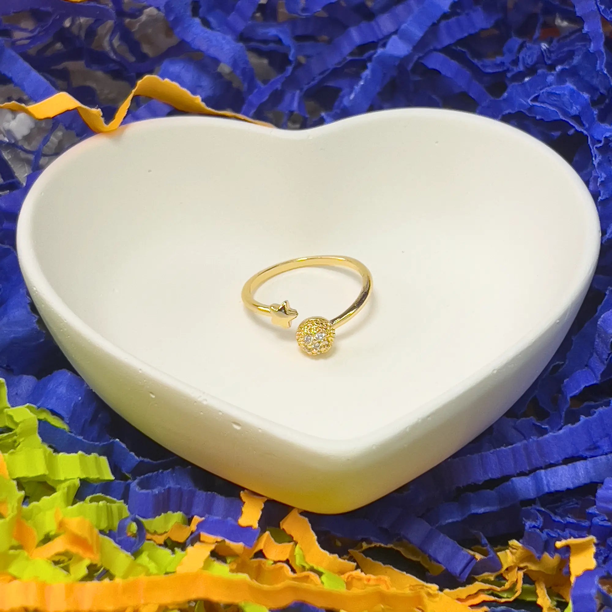 Golden Ring with Floral Accent and Sparkling Ball